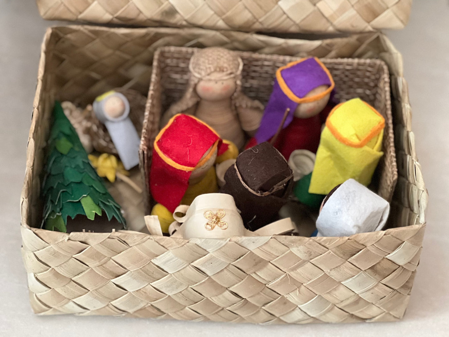 A set of 7 religious figures put in the box made of buri.