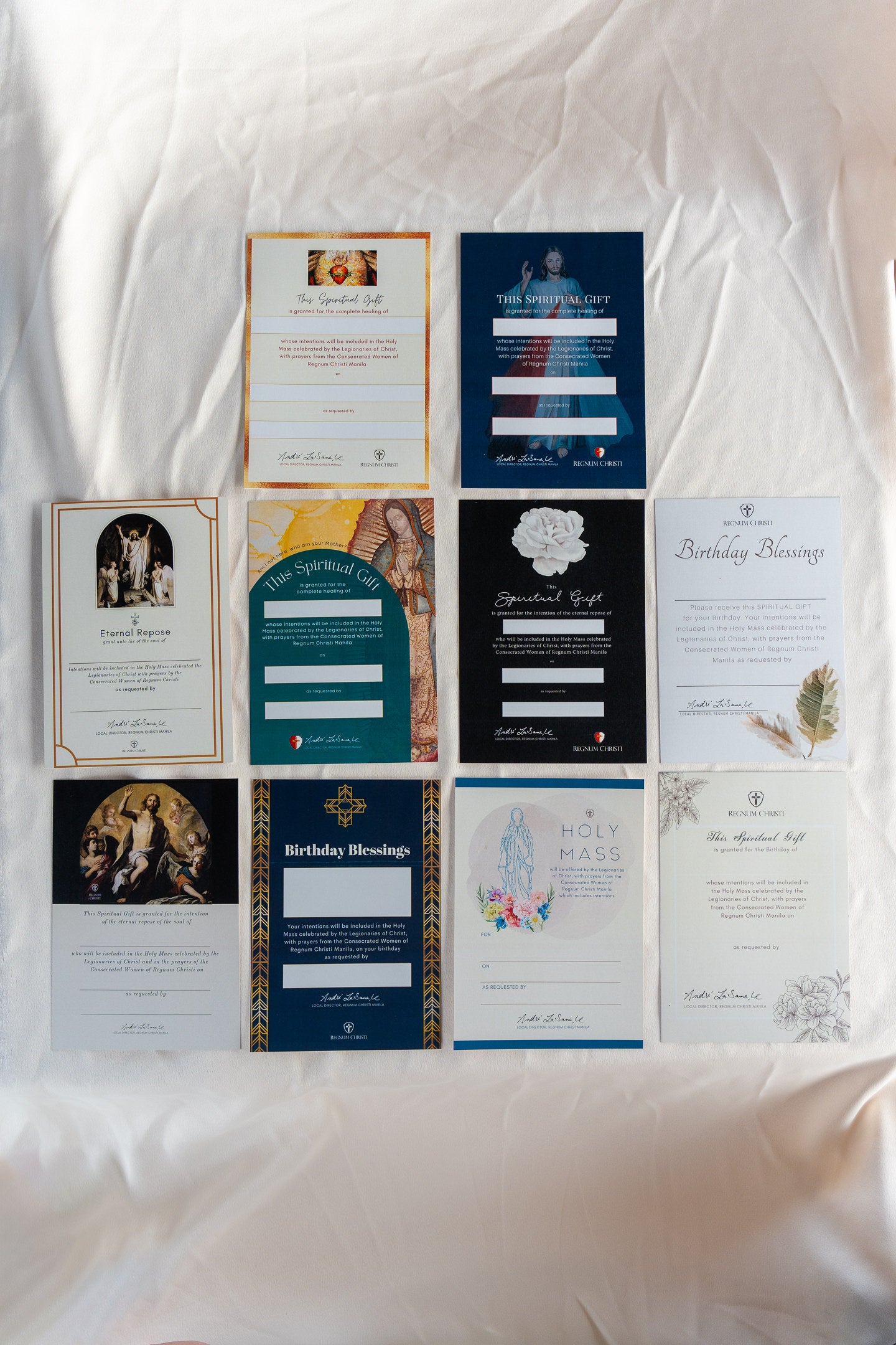 A collection prayer cards with different design offered for a Holy  Mass.