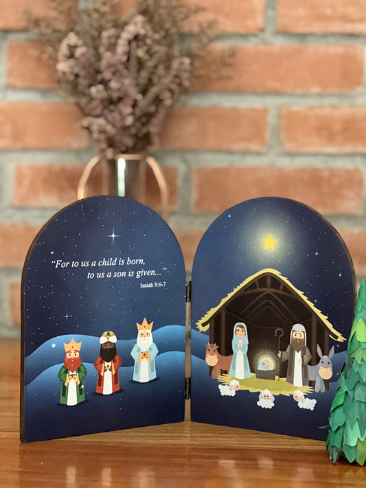 A nativity scene with a depiction of the birth of Jesus Christ, featuring figures such as Joseph, Mary, and baby Jesus in the right side and the three Wise Men in the left side, surrounded by a night sky with stars.