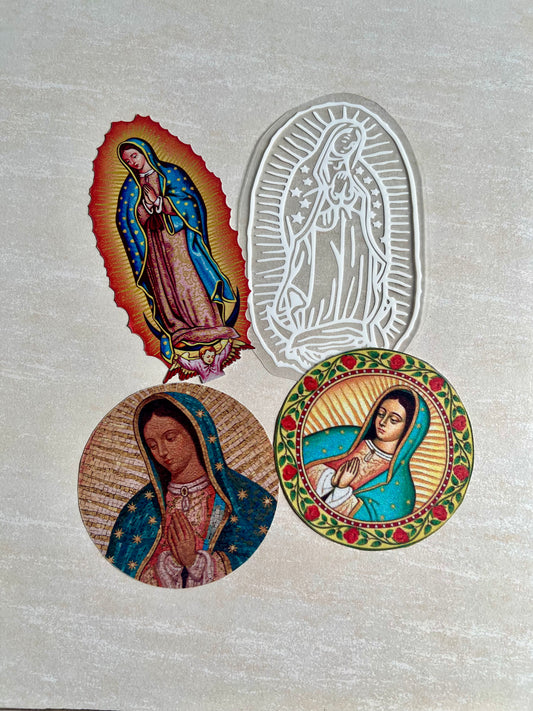 A set of four round stickers with religious themes, including an image of the Virgin Mary and a depiction of a woman in a traditional, colorful outfit.